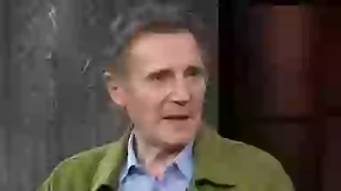 Liam Neeson discusses how he navigated NSFW ’threesome’ with Pamela Anderson in new movie